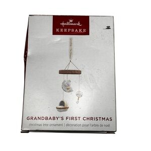 Hallmark Keepsake Ornament. “Grandbaby’s first Christmas”. Porcelain and wood.